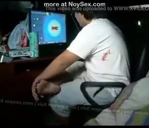 Sucking cock while their friend playing games on his pc