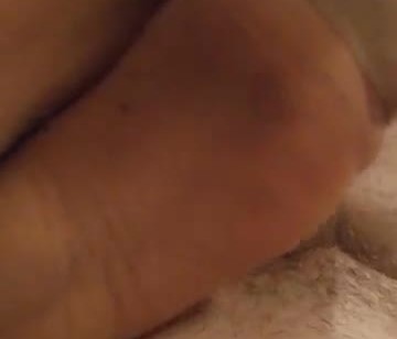 Homemade footjob with sweaty nylons and cumshot